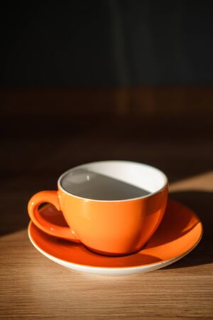 Tea and coffee Cup and plate orange and white colour