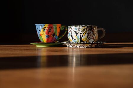 Two Tea and coffee Cups and plates different colourの写真素材