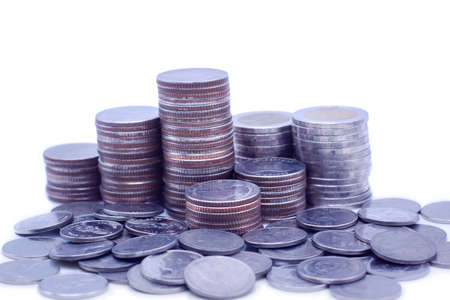 Rows of coin stacks and a lot of coins. How to show banking,education,saving money concept. Metaphor...