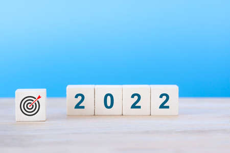 Wood cube target icon with in New year 2022, new business, changing for new target.