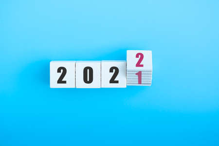 The concept for changing year 2021 to 2022, flipping cube 1 to 2, Happy new Year 2022.の写真素材