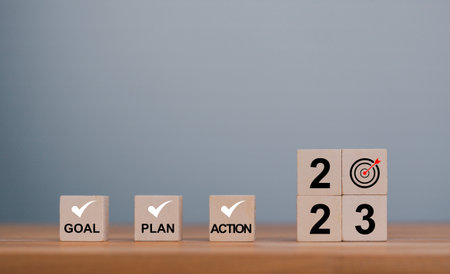 Action Plan for 2023. Cube with texts are 2023, goal, plan and action prepare to do the list and plan for New Year, development to success and motivation concept.の写真素材