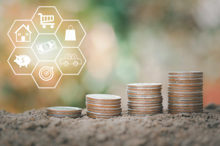 Concept of saving money for future use and business success goal concept. Stacking of money coin...