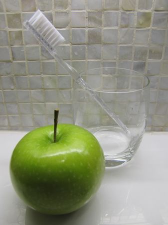 Apple and glass cupの写真素材