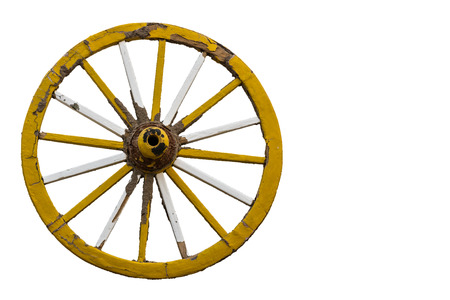 Old cart wheel yellow on a white backgroundの写真素材