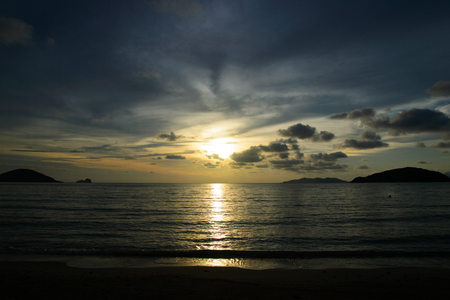 Sea at sunset with beautiful sky and cloudsの写真素材
