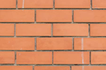 Wall terracotta tiles red spacing groove.の写真素材