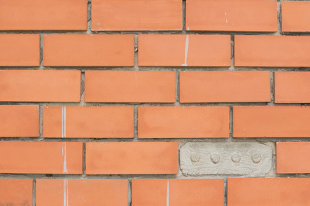 Wall terracotta tiles red spacing groove.の写真素材