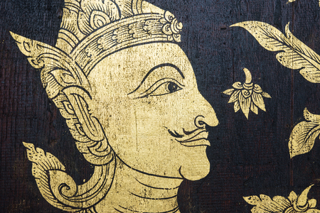 Thailand golden angel paintings pattern On the black woodの写真素材