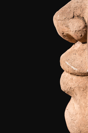 Stone carving close-up mouth and nose on a black background.の写真素材