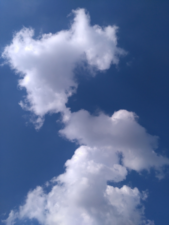 Sky and white clouds daytime.の写真素材