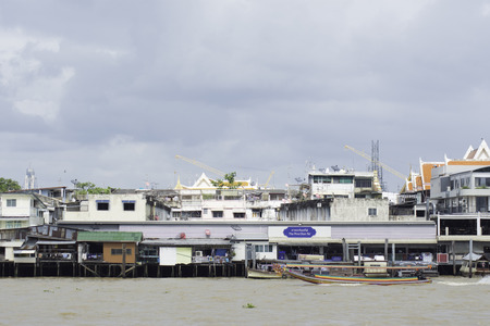 Waterfront community Chao Phraya River at the end of July 2017 in Bangkok, Thailand.のeditorial素材