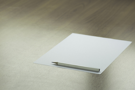 Pencil with blank paper on the desk and thoughtless ideas.の写真素材