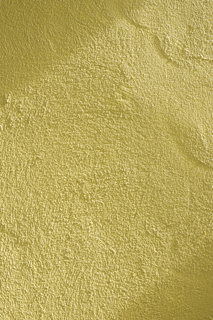 Plain surface is not smooth, painted yellow.の写真素材