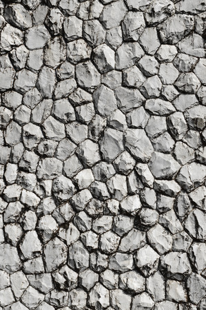 weathered rock and stone wall backgroundの写真素材