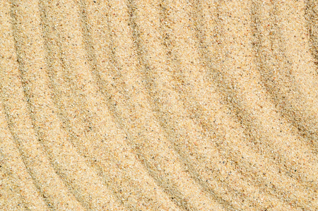 Sand Texture. Brown sand. Background from fine sand. Sand backgroundの写真素材