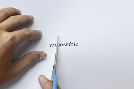 Possible Concept. Changing The Word Impossible to Possible. seperate word im and possible by cutting.の写真素材