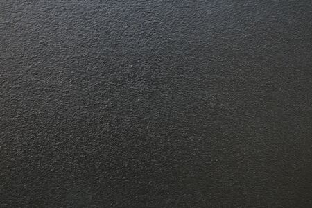 Black concrete wall texture background.
