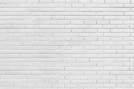 white brick wall background in rural room, Abstract weathered texture stained old stucco light gray and aged paint white brick wall background, grungy rusty blocks of brickwork technology architecture wallpaperの写真素材