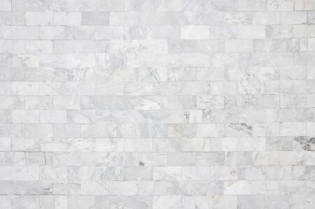 White marble wall pattern with high resolution. Brick wall made from marble use as texture and...