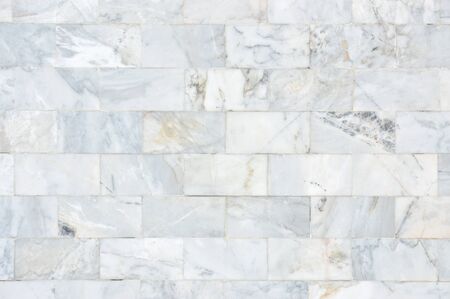 White marble wall pattern with high resolution. Brick wall made from marble use as texture and...