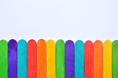 Colorful wood Ice cream sticks on white background. Arranged wood stick.の写真素材