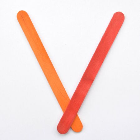 V, The English alphabet from wood sticks, isolated on white background.