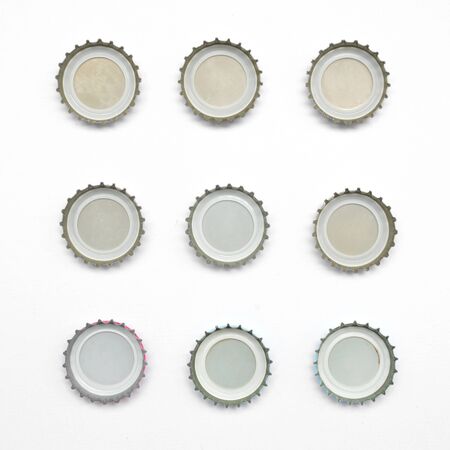 Bottle caps on white backgroundの写真素材