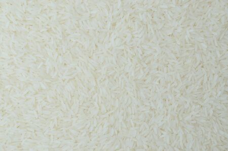 White rice background and texture, Jasmine raw grain.の写真素材