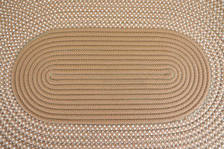 woven mat textile use as background, brown handmade doormat top view.の写真素材