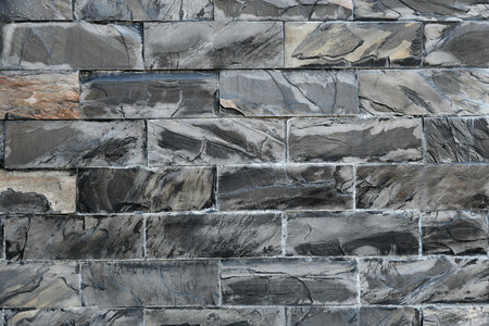 Abstract Black brick wall texture for pattern background. Close - up image