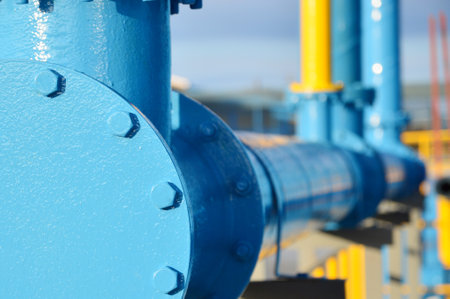 Water steel pipe close up image. Select focus of drink water piping. Flange Pipe Fitting with copy space.の写真素材