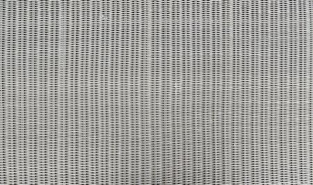 Texture of gray plastic chair surface. Plastic weave pattern background.の写真素材