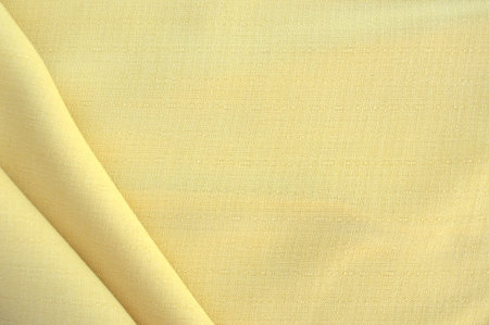 Golden fabric surface texture and backgroundの写真素材