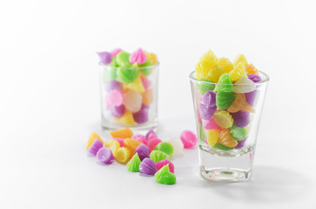 Two glass of colorful sweetsの写真素材