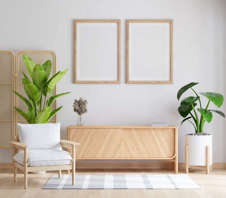 Wood sideboard in white living room interior with two picture frame mockup, 3D renderingの写真素材