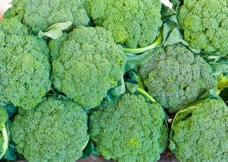 green fresh broccoli background in market
