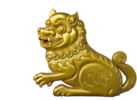 lion wood carve gold paint in templeの写真素材