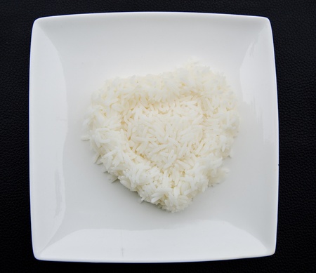 White steamed rice in white square  bowl の写真素材