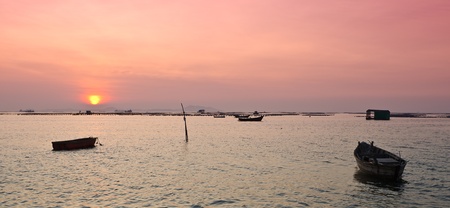 boat at sunset, Phukrt, south of Thailandの写真素材