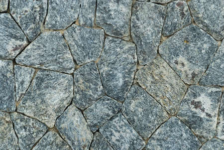 Background of stone wall textureの写真素材