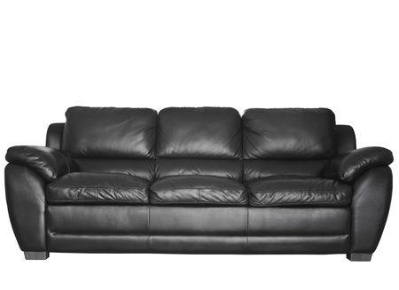 Image of a modern black leather sofa isolated against white backgroundの写真素材