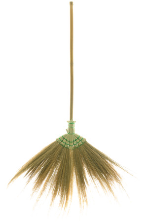 broom made from dry grass isolated on white backgroundの写真素材