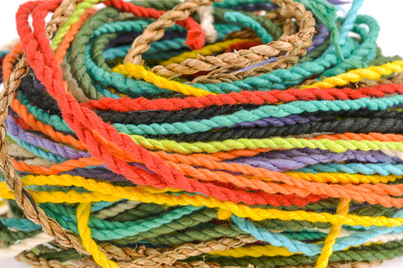 colorful rope  made from mulberry paper on white backgroundの写真素材