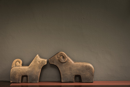 vintage style of engraving dog and sheep shape of woodの写真素材
