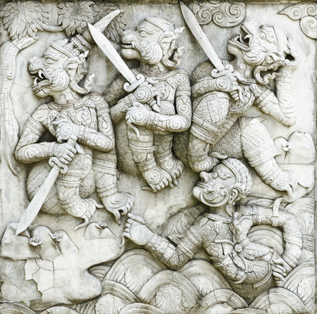 masterpiece of traditional Thai style stucco art old about Ramayana story on temple decorative wall at Wat Panan Choeng temple, Ayutthaya, Thailand. World Heritage Siteの写真素材