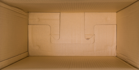 close up packed or hidden inside a cardboard packaging boxの写真素材