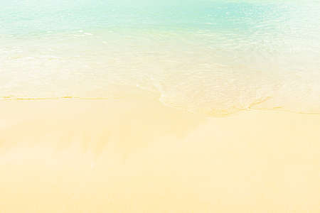 close up sea water and sand on tropical beach at Phuket province, Thailand