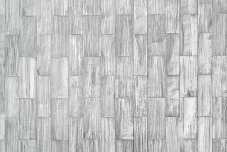 background and texture of brown color decorative old wood on surface wall in rectangular shape. vintage style teak wood background.の写真素材