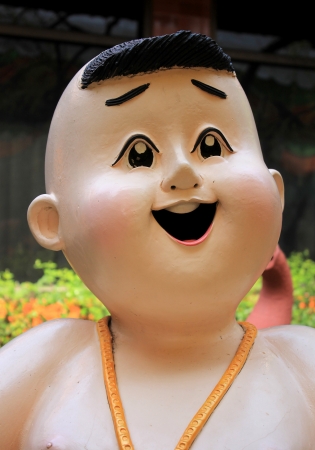 Statue children laugh の写真素材